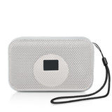 רמקול בלוטוס קומפקטי עם מעמד לטלפון חכם לבן