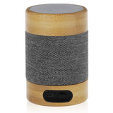 רמקול בלוטוס עם תאורת LED מבמבוק טבעי בשילוב אריג מאחור