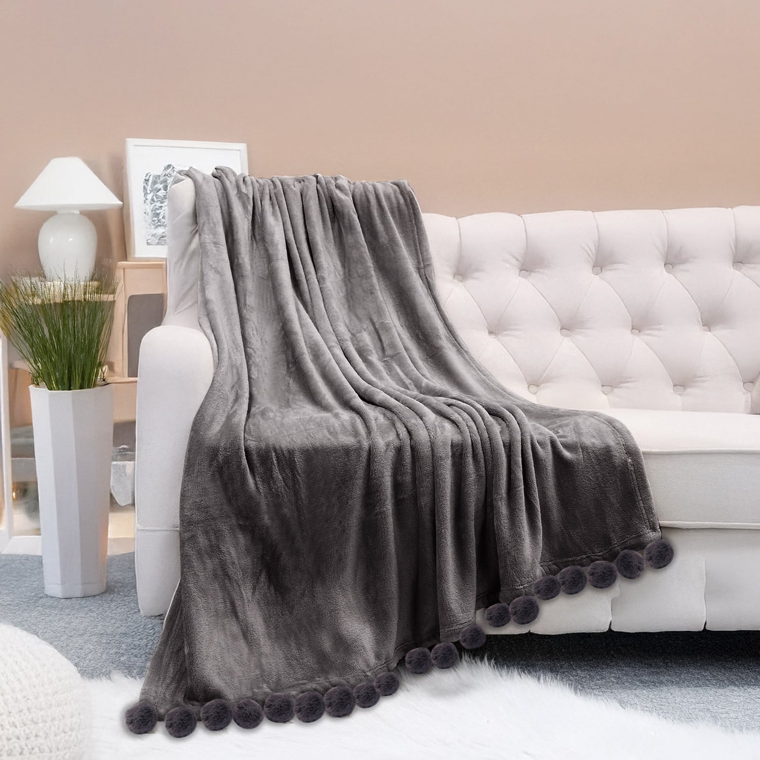 שמיכת קורל עם פונפן נעימה במיוחד - פונפונים