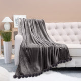 שמיכת קורל עם פונפן נעימה במיוחד - פונפונים